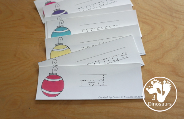 Christmas Ornament Color Pack - with 78 pages of printables with color easy reader book, color clip cards, color tracing strips, color writing strips, color pocket chart cards, color word writing, color word puzzles, and more all to work on learning color words. This is a great Christmas Ornament theme - 3Dinosaurs.com