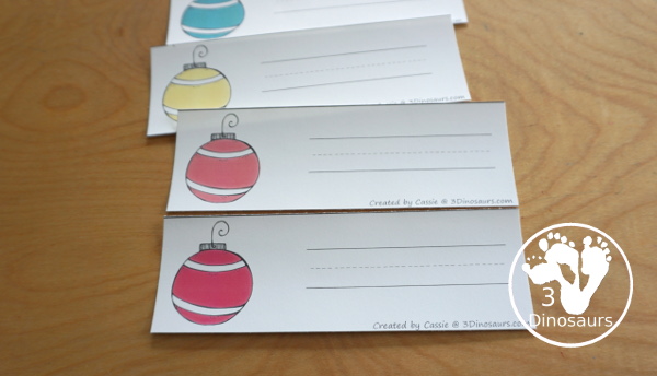 Christmas Ornament Color Pack - with 78 pages of printables with color easy reader book, color clip cards, color tracing strips, color writing strips, color pocket chart cards, color word writing, color word puzzles, and more all to work on learning color words. This is a great Christmas Ornament theme - 3Dinosaurs.com