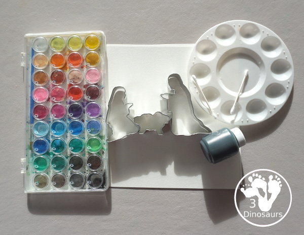 Nativity Painting with Cookie Cutters is a great nativity activity that you can do with kids. A great nativity scene that kids can make with watercolors and paint and cookie cutters. - 3Dinosaurs.com