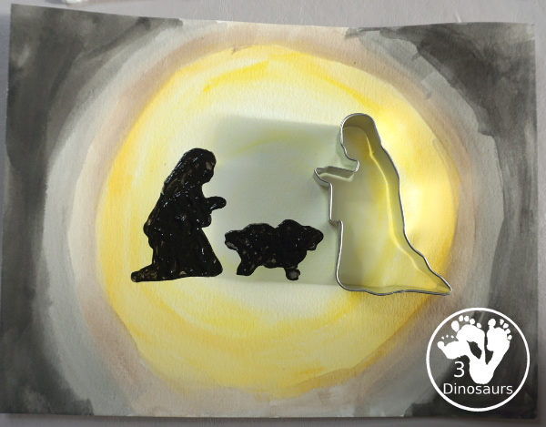 Nativity Painting with Cookie Cutters is a great nativity activity that you can do with kids. A great nativity scene that kids can make with watercolors, paint, and cookie cutters. - 3Dinosaurs.com