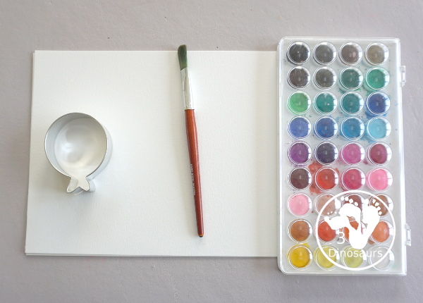 Balloon Watercolor Painting with Cookie Cutters - a simple watercolor painting with a balloon cookie cutter that kids of all ages can do for a party or New Year's Eve - 3Dinosaurs.com