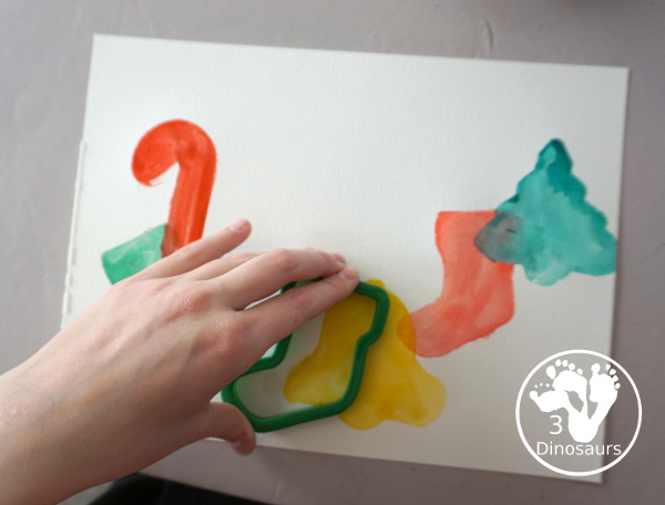 Christmas Watercolor Cookie Cutter Painting - easy Christmas watercolor painting with candy canes, bells, stockings and trees - 3Dinosaurs.com