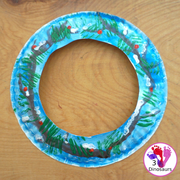 Winter Evergreen Wreath Craft - a fun wreath craft with a evergreen tree in winter with berries and snow. - 3Dinosaurs.com