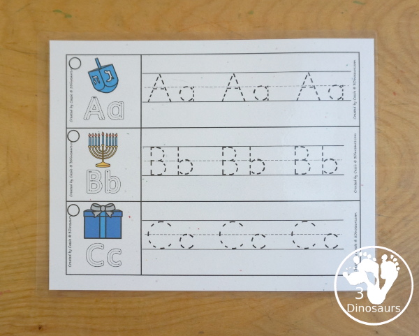 Free Hanukkah ABC Tracing Strip Printables - with uppercase and lowercase together. You have fun kids with Hanukkah items plus you can see an example of how to trace the letters - 3Dinosaurs.com