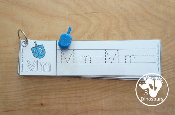 Free Hanukkah ABC Tracing Strip Printables - with uppercase and lowercase together. You have fun kids with Hanukkah items plus you can see an example of how to trace the letters - 3Dinosaurs.com