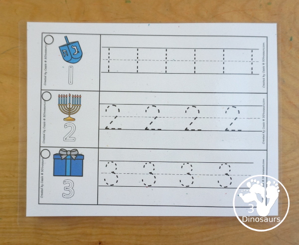Free Hanukkah Number Tracing Strips - with numbers 0 to 20. You can trace the numbers and an example of how to trace the numbers on the strips, plus Hanukkah items on each tracing strip. - 3Dinosaurs.com