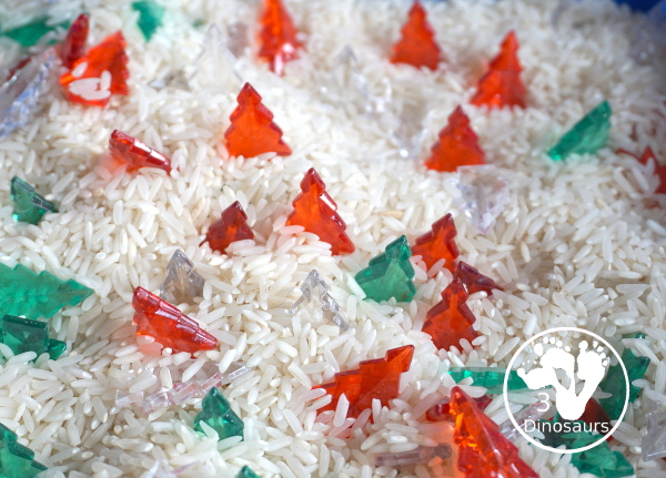 Christmas Tree Sensory Bin - a simple Christmas sensory bin with rice and acrylic Christmas trees. Simple and easy to set up and use. - 3Dinosaurs.com