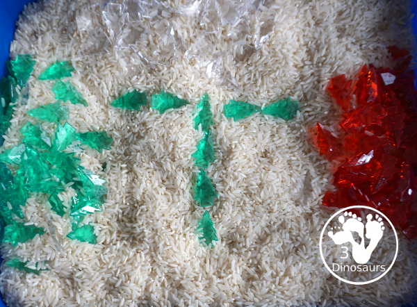 Christmas Tree Sensory Bin - a simple Christmas sensory bin with rice and acrylic Christmas trees. Simple and easy to set up and use. - 3Dinosaurs.com