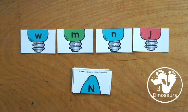 Free Christmas Lights ABC Matching Printable - a fun letter matching printable for kids with different colored Christmas lights. You match uppercase letters and lowercase letters- 3Dinosaurs.com