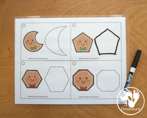 Free Gingerbread Shape Tracing Card Printable - has 12 shapes for kids to trace. You have a picture of the gingerbread man face with the shape, and then a shape to trace. 3Dinosaurs.com