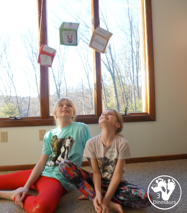 Free Winter Sports Gross Motor Dice - 6 movements and speed dice for kids to have fun with - 3Dinosaurs.com #wintersports #freeprintable