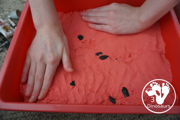 Mars Themed Sensory Bin with kinetic sand - a fun way to explore the red planet Mars -  3Dinosaurs.com