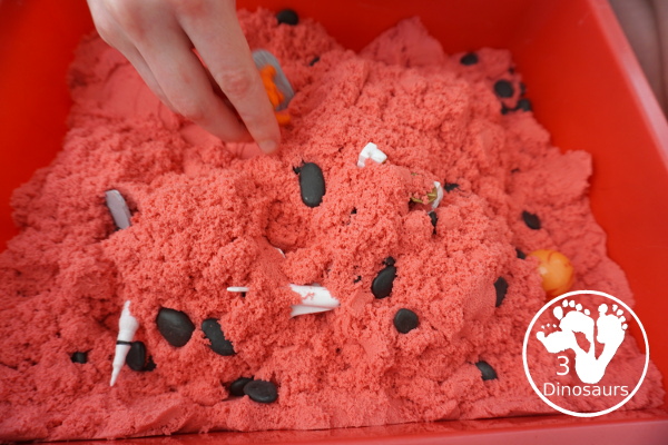 Mars Themed Sensory Bin with kinetic sand - a fun way to explore the red planet Mars -  3Dinosaurs.com