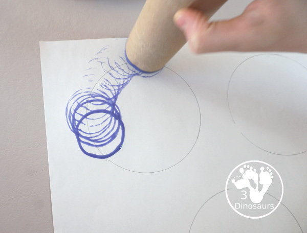 Paper Roll Olympic Rings Painting - an easy Olympic craft that you can use with kids to make an Olympic flag - 3Dinosaurs.com