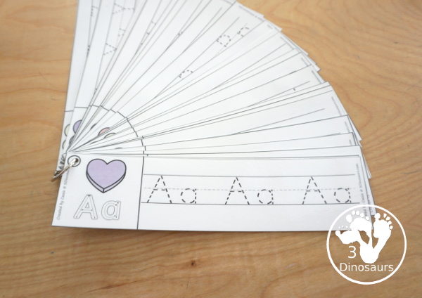 Free Valentine Theme ABC Tracing Strips - with uppercase and lowercase together. You have fun kids with a heart plus you can see an example of how to trace the letters - 3Dinosaurs.com
