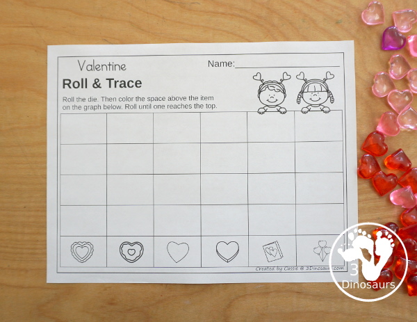 Valentine Roll & Graph With Trace Letters, Numbers & Shapes with a folding die and cube die with a graphing sheet, graphing with tracing numbers, graphing with tracing letters and graphing with tracing shapes. All with a fun heart theme for Valentine for prek and kindergarten - 3Dinosaurs.com