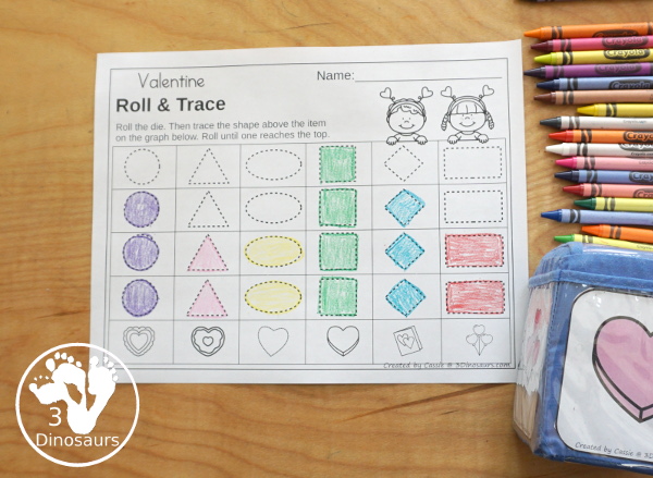 Valentine Roll & Graph With Trace Letters, Numbers & Shapes with a folding die and cube die with a graphing sheet, graphing with tracing numbers, graphing with tracing letters and graphing with tracing shapes. All with a fun heart theme for Valentine for prek and kindergarten - 3Dinosaurs.com