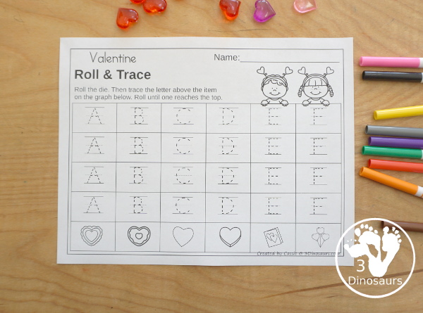 Valentine Roll & Graph With Trace Letters, Numbers & Shapes with a folding die and cube die with a graphing sheet, graphing with tracing numbers, graphing with tracing letters and graphing with tracing shapes. All with a fun heart theme for Valentine for prek and kindergarten - 3Dinosaurs.com