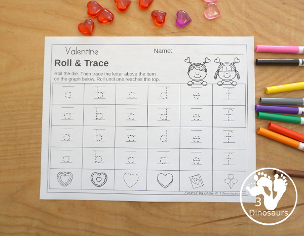 Valentine Roll & Graph With Trace Letters, Numbers & Shapes with a folding die and cube die with a graphing sheet, graphing with tracing numbers, graphing with tracing letters and graphing with tracing shapes. All with a fun heart theme for Valentine for prek and kindergarten - 3Dinosaurs.com