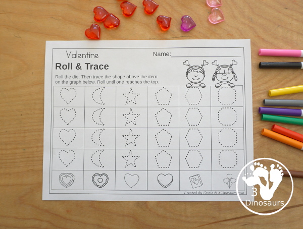 Valentine Roll & Graph With Trace Letters, Numbers & Shapes with a folding die and cube die with a graphing sheet, graphing with tracing numbers, graphing with tracing letters and graphing with tracing shapes. All with a fun heart theme for Valentine for prek and kindergarten - 3Dinosaurs.com