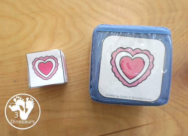 Valentine Roll & Graph With Trace Letters, Numbers & Shapes with a folding die and cube die with a graphing sheet, graphing with tracing numbers, graphing with tracing letters and graphing with tracing shapes. All with a fun heart theme for Valentine for prek and kindergarten - 3Dinosaurs.com