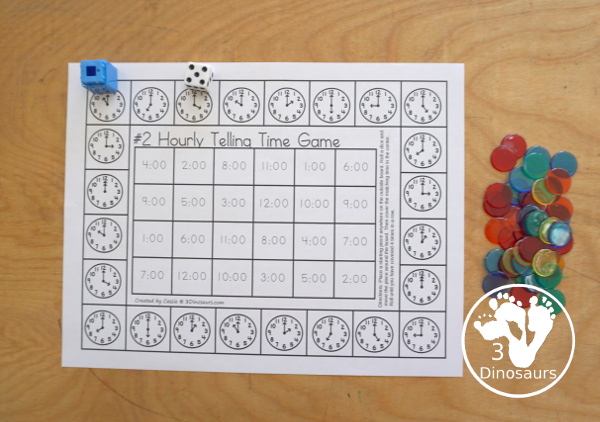 Free Hourly Telling Time Game Printables - two telling time games with analog clocks on the outside of the game and digital time and telling time words for the two game options with recording sheets - 3Dinosaurs.com