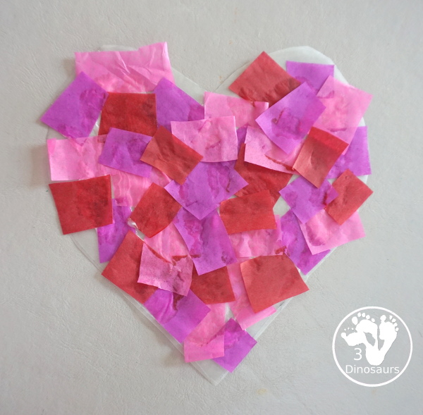 Stained Glass Hearts Craft For Valentine's Day - a simple wax paper craft for kids with tissue paper glue and tissue paper. - 3Dinosaurs.com