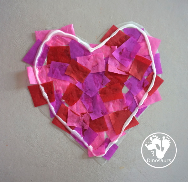 Stained Glass Hearts Craft For Valentine's Day - a simple wax paper craft for kids with tissue paper glue and tissue paper. - 3Dinosaurs.com