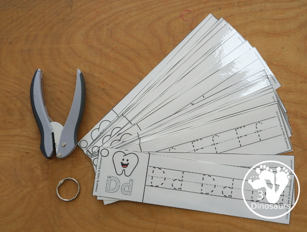 Free Tooth ABC Tracing Strips - with uppercase and lowercase together. You have fun kids with a tooth plus you can see an example of how to trace the letters - 3Dinosaurs.com