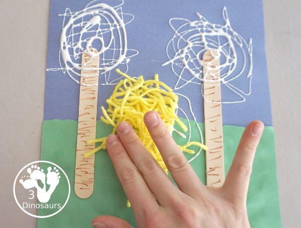 Yarn Truffula Trees - a fun and easy craft for the book The Lorax and Earth Day. You use paper, craft sticks and yarn to make the truffula trees.  3Dinosaurs.com