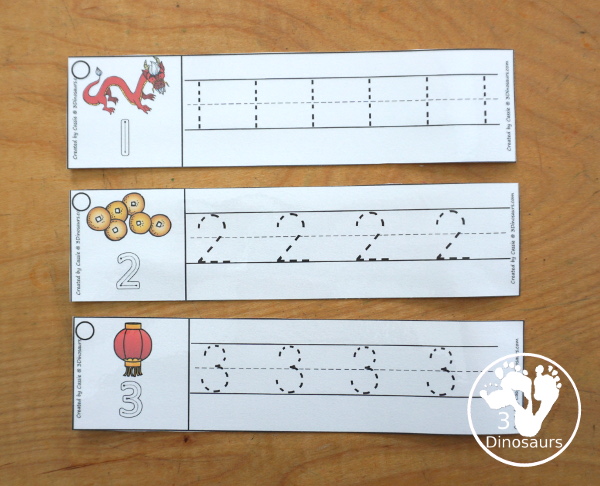 Free Lunar New Year Number Tracing Strips - with numbers 0 to 20. You can tracing the numbers and an example of how to trace the numbers on the strips, plus an dragon, coins or lantern on each number tracing strip. - 3Dinosaurs.com