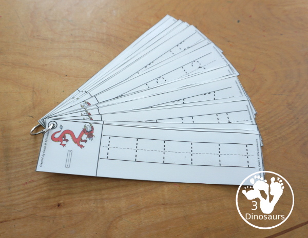 Free Lunar New Year Number Tracing Strips - with numbers 0 to 20. You can tracing the numbers and an example of how to trace the numbers on the strips, plus an dragon, coins or lantern on each number tracing strip. - 3Dinosaurs.com