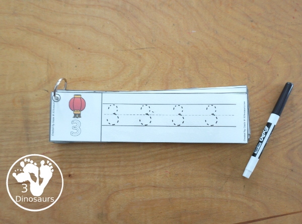 Free Lunar New Year Number Tracing Strips - with numbers 0 to 20. You can tracing the numbers and an example of how to trace the numbers on the strips, plus an dragon, coins or lantern on each number tracing strip. - 3Dinosaurs.com