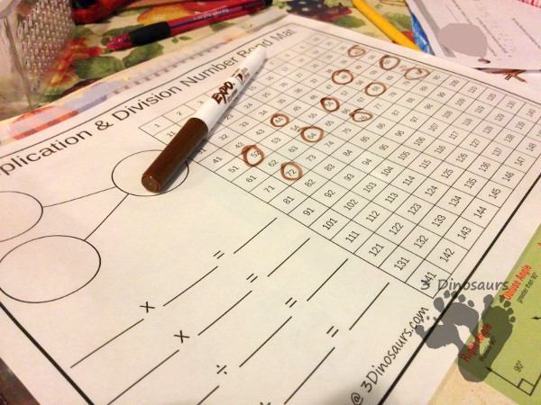 Free Multiplication Number Bond Mat - 10 different color options with chart to cover 1 through 12 multiplication and division- 3Dinosaurs.com