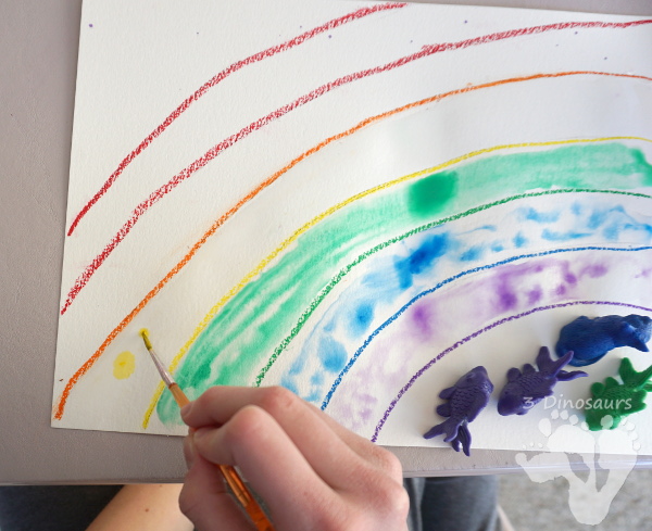 Watercolor Rainbow Process Art - kids can great creative and explore how water spreads things out with this craft for St. Patricks Day or springtime - 3Dinosaurs.com
