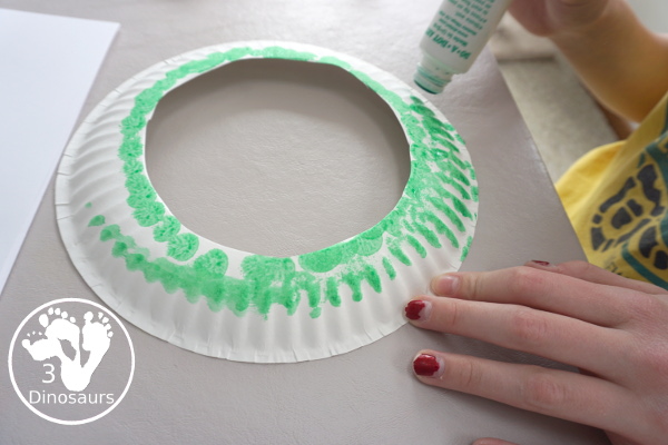 Flower Themed Paper Plate Wreath: Oil Pastels - fun and easy wreaths to make at any time using flower punches and paper plates - 3Dinosaurs.com