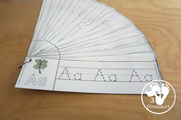 Free St Patrick's Day Themed ABC Tracing Strips - storing the ABC tracing strips on a ring to use for learning centers- 3Dinosaurs.com