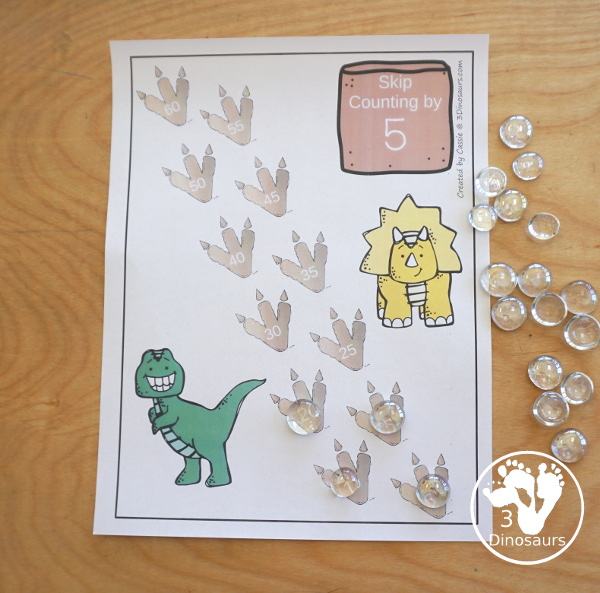 Free Dinosaur Skip Counting Mats - With 12 Skip Counting Mats with numbers from 1 to 12 with dinosaur footprints and dinosaur theme - 3Dinosaurs.com