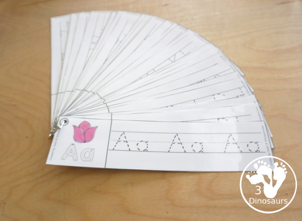 Free Flower Theme ABC Tracing Strips - with uppercase and lowercase together. You have flowers, plus you can see an example of how to trace the letters - 3Dinosaurs.com