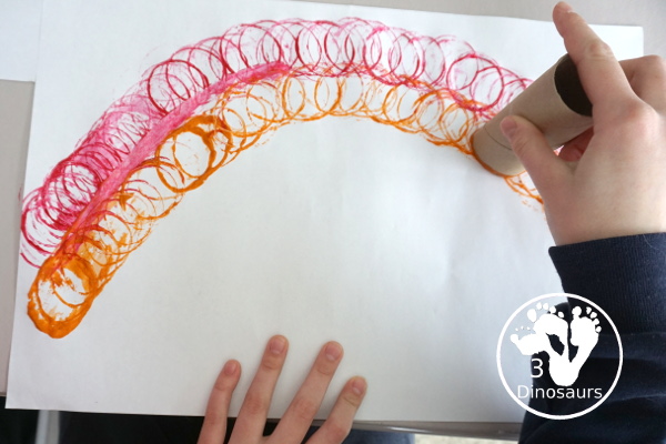 Paper Roll Rainbow Painting - a simple rainbow painted with paper rolls this is a great rainbow, spring and St. Patrick's Day craft - 3Dinosaurs.com