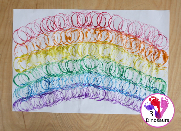 Paper Roll Rainbow Painting - a simple rainbow painted with paper rolls this is a great rainbow, spring and St. Patrick's Day craft - 3Dinosaurs.com