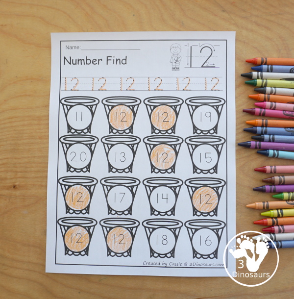 Basketball Number Find Printable with numbers 0 to 20. It has numerical numbers and number words. You have handwriting for numbers and the search and find the numbers on the hoops - 3Dinosaurs.com