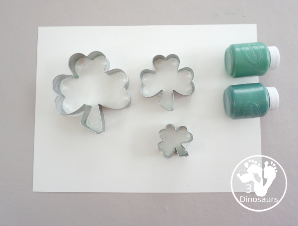 Clover Stamping Painting For Kids - a fun cookie cutter painting for kids with clover cookie cutters a fun St. Patrick's Day activities for kids - 3Dinosaurs.com