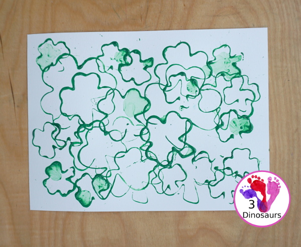 Clover Stamping Painting For Kids - a fun cookie cutter painting for kids with clover cookie cutters a fun St. Patrick's Day activities for kids - 3Dinosaurs.com