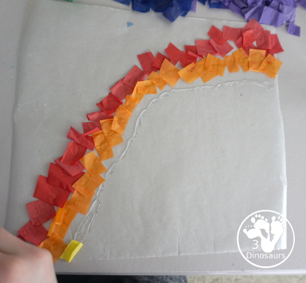 Tissue Paper Rainbow - a great craft you can make to hang in a window or display in a room. A great spring fine motor craft for kids - 3Dinosaurs.com