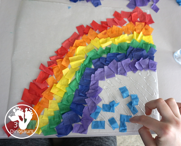 Tissue Paper Rainbow - a great craft you can make to hang in a window or display in a room. A great spring fine motor craft for kids - 3Dinosaurs.com