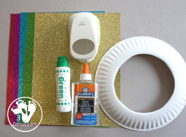 Glitter Easter Egg Wreath Craft - a fun Easter Egg wreath made with a paper plate and ovals for the eggs - 3Dinosaurs.com