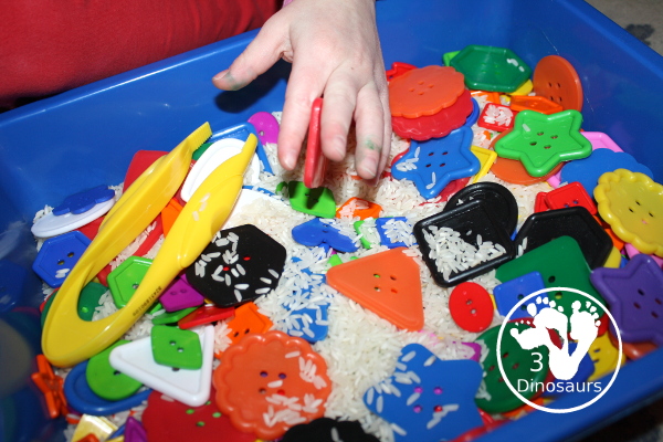 Shape Button Sensory Bin - a simple sensory bin made with rice base and different sizes of shape buttons. An easy shape sensory bin for prek and kindergarten. - 3Dinosaurs.com