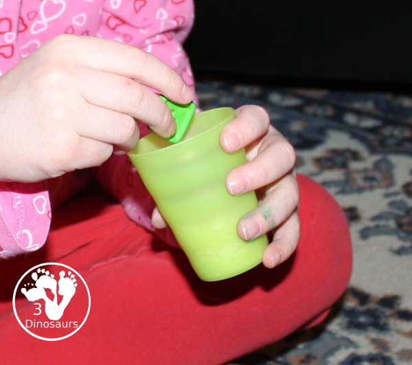 Shape Button Sensory Bin - a simple sensory bin made with rice base and different sizes of shape buttons. An easy shape sensory bin for prek and kindergarten. - 3Dinosaurs.com