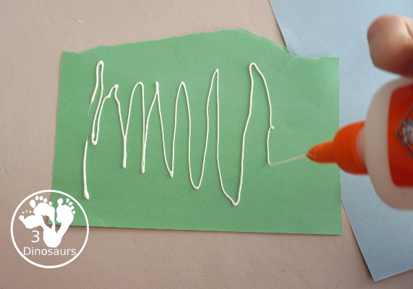 Washi Tape Truffula Tree Craft - a fun Lorax craft for kids to make with a little fun with fine motor truffula craft that kids can make. It is made with paper, washi tape and craft sticks. - 3Dinosaurs.com